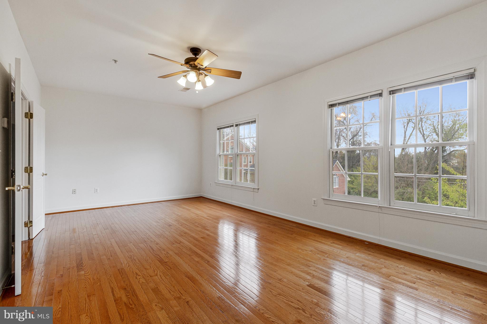 1646 Colonial Hills Drive McLean, VA 22102 - Photo 20 of 39 a view of an empty room with wooden floor and a window