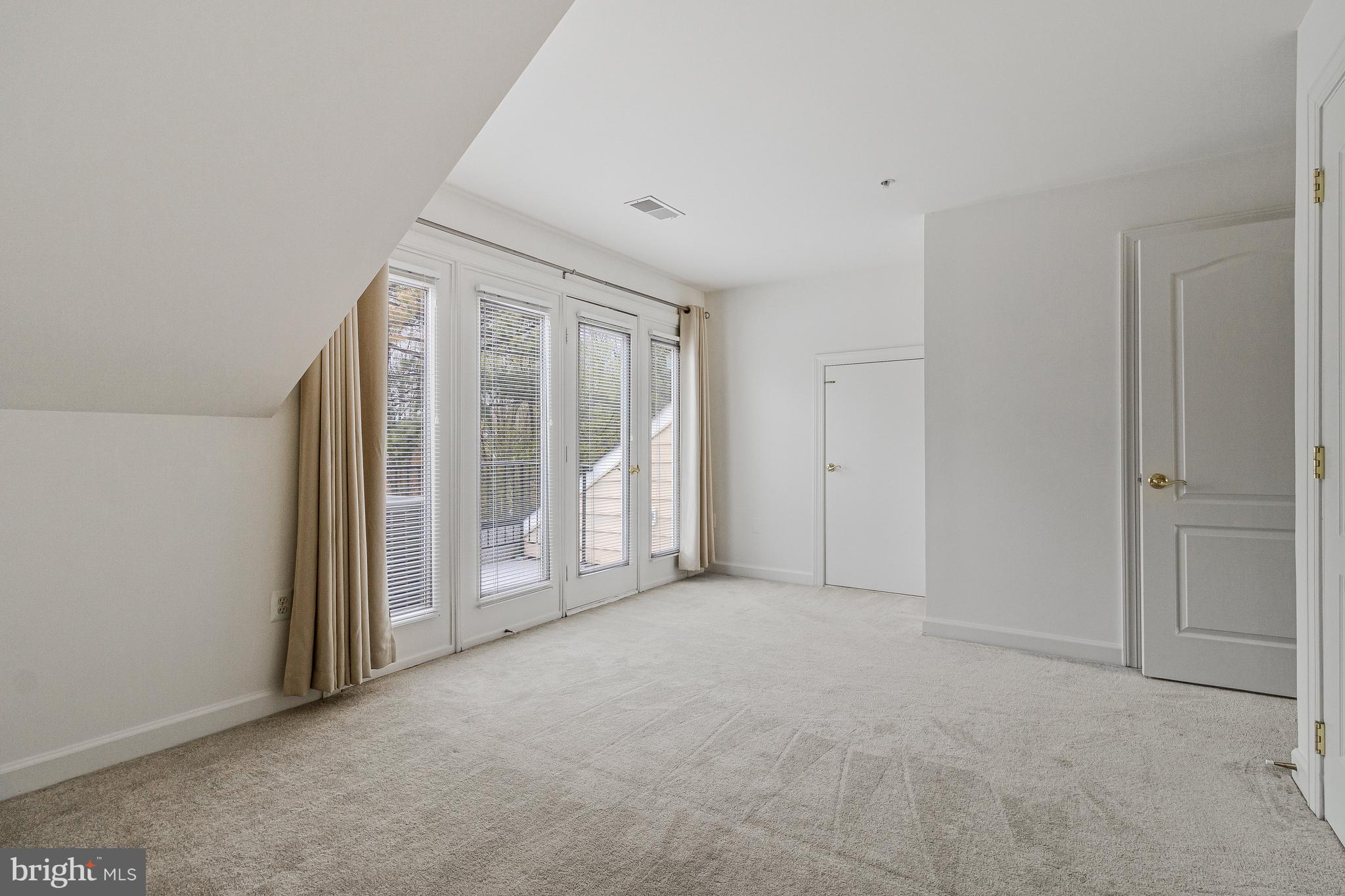 1646 Colonial Hills Drive McLean, VA 22102 - Photo 31 of 39 a view of an empty room with glass door