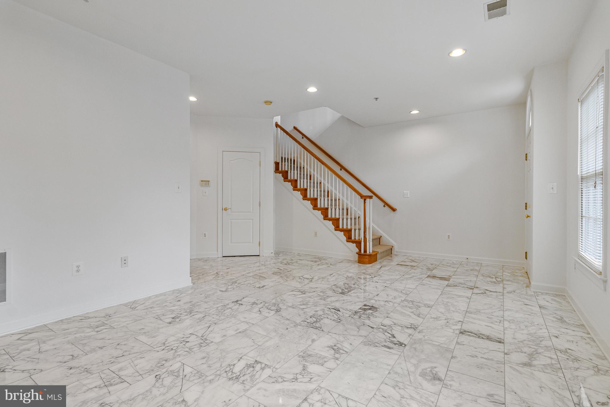 1646 Colonial Hills Drive McLean, VA 22102 - Photo 7 of 39 a view of an empty room with stairs