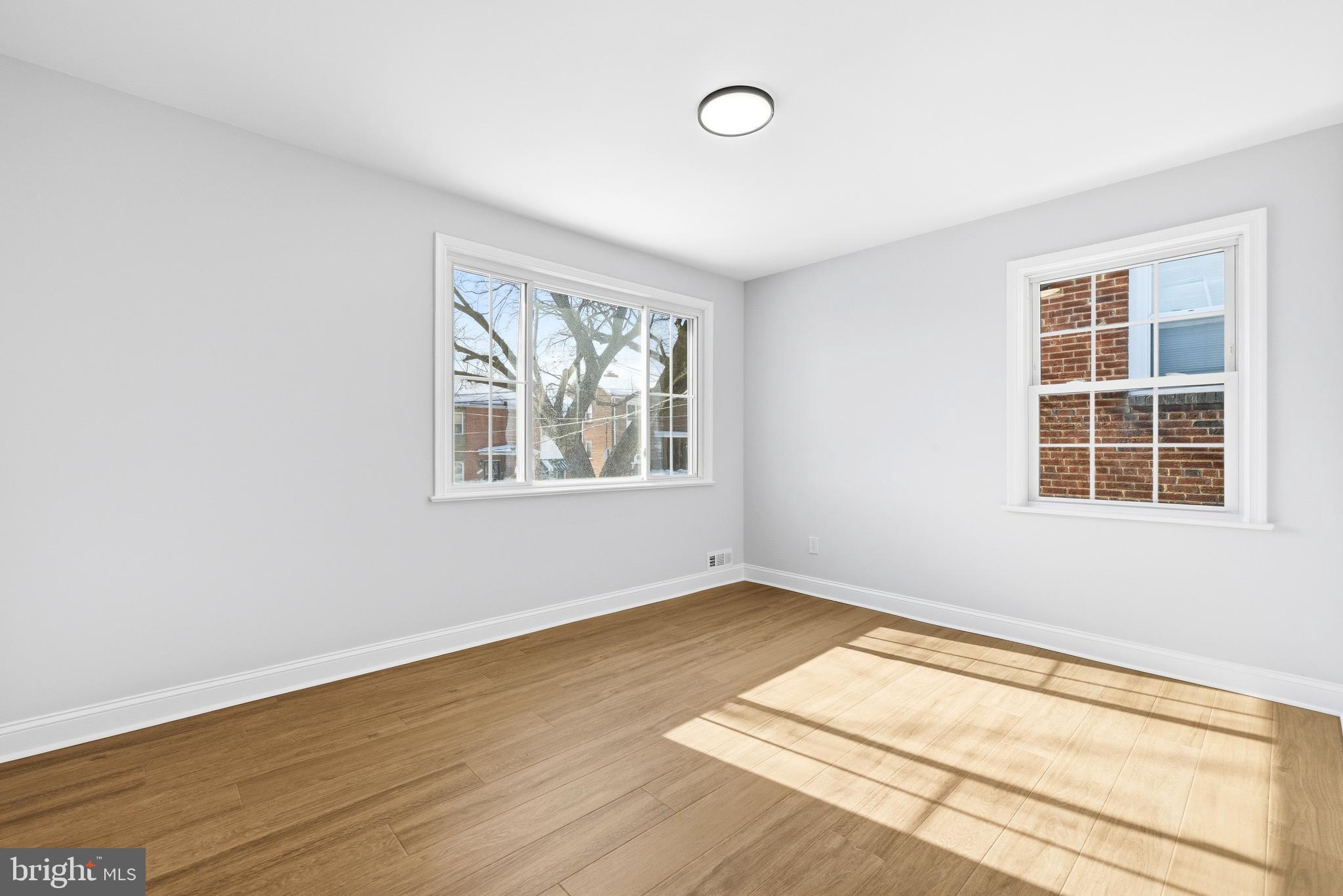 334 Nicholson Street Northeast Washington, DC 20011 - Photo 15 of 23 Enormous 3rd bedroom with tons of natural light.