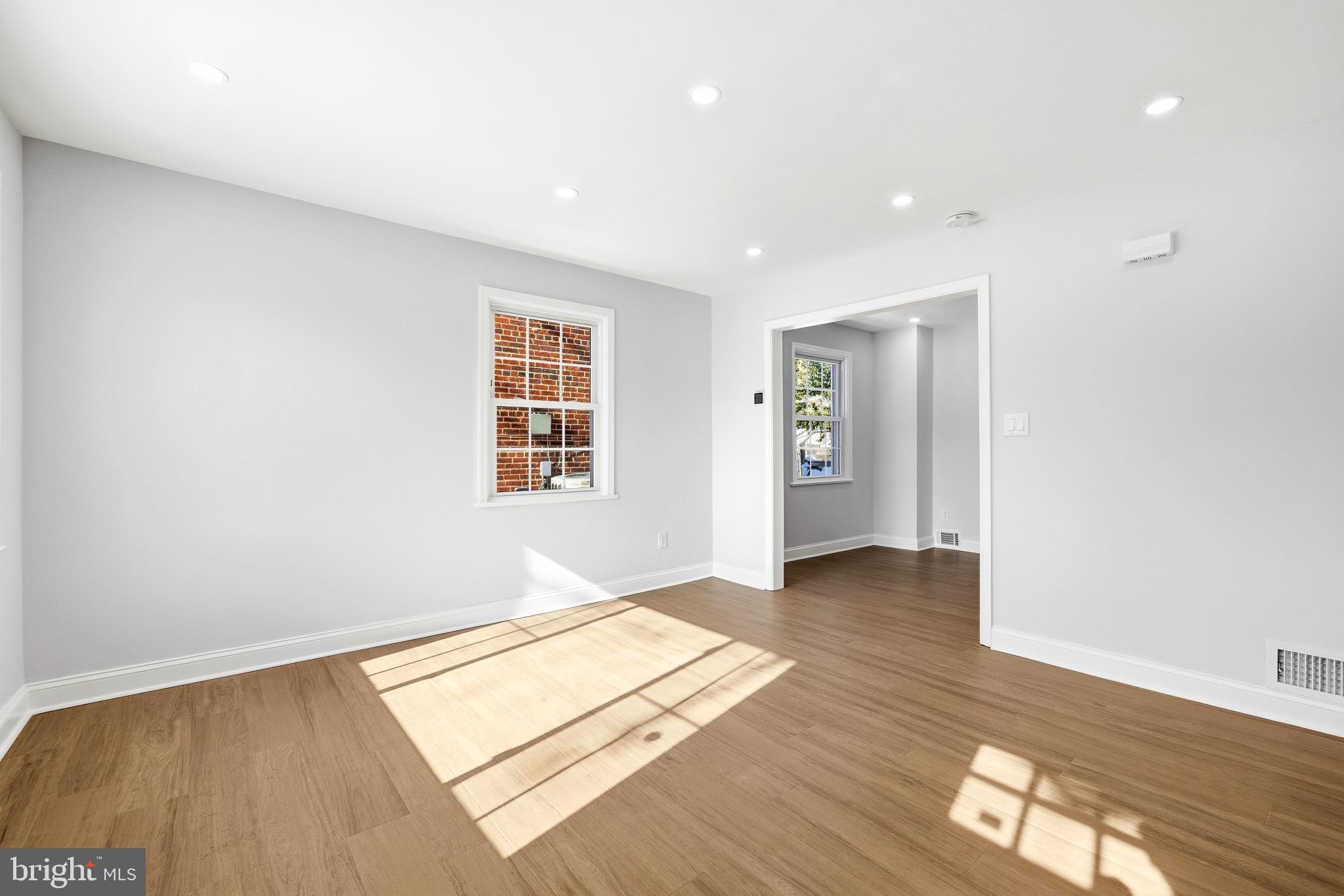 334 Nicholson Street Northeast Washington, DC 20011 - Photo 4 of 23 Open Concept Living Room leads to the Dining Room