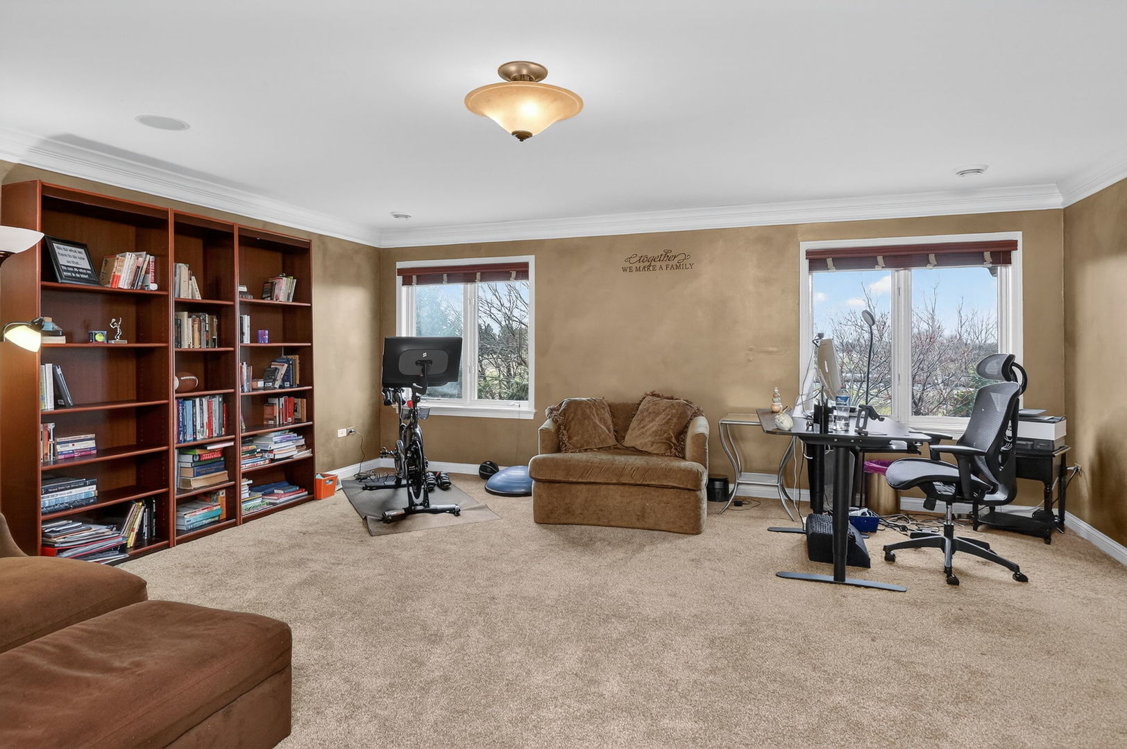 1 Crenshaw Court Bolingbrook, IL 60490 - Photo 38 of 56 a view of a livingroom with workspace and a couch
