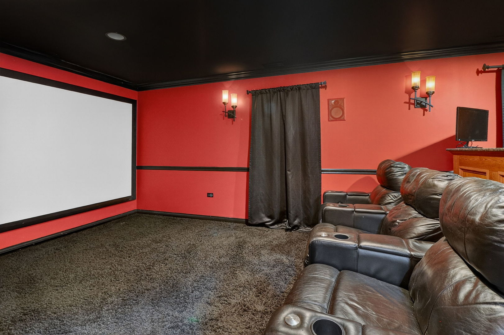 1 Crenshaw Court Bolingbrook, IL 60490 - Photo 46 of 56 a living room with furniture and a flat screen tv