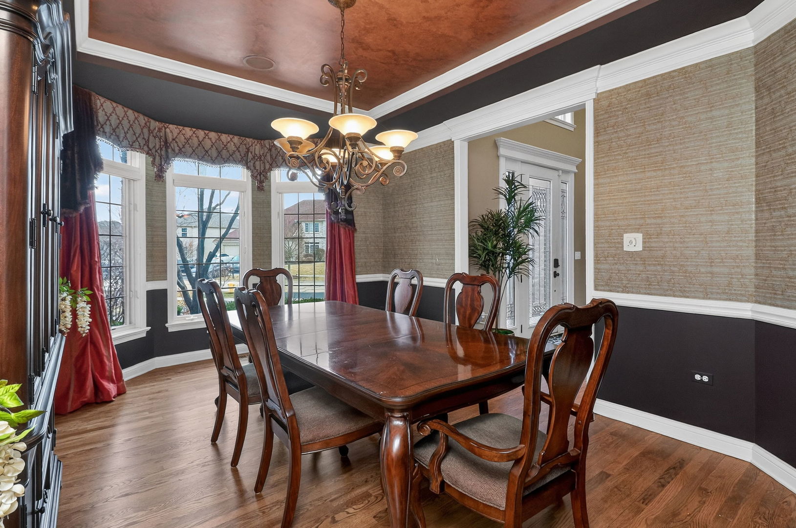 1 Crenshaw Court Bolingbrook, IL 60490 - Photo 5 of 56 a view of a dining room with furniture window and wooden floor
