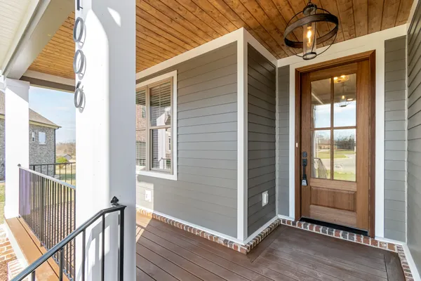 a view of front door and porch