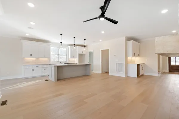 a view of a kitchen with furniture and a kitchen