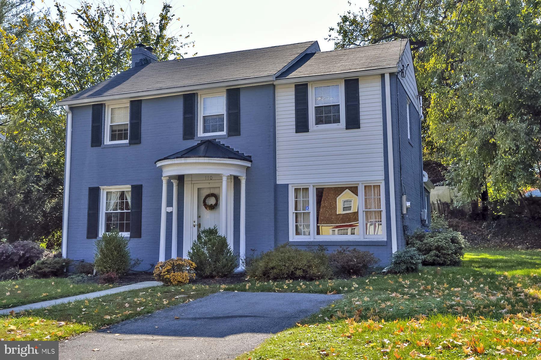 110 Normandy Drive Silver Spring, MD 20901 - Photo 1 of 20 a front view of a house with garden