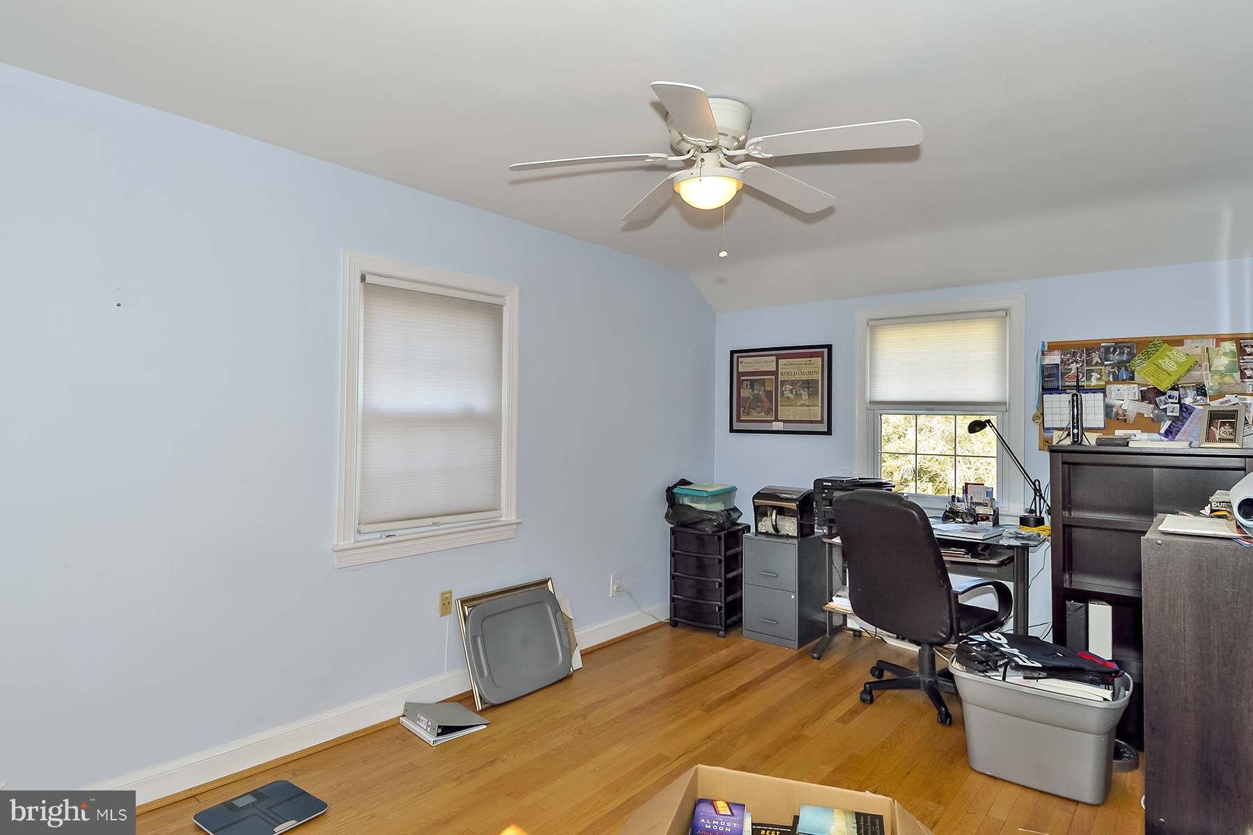 110 Normandy Drive Silver Spring, MD 20901 - Photo 13 of 20 a bedroom with a workspace