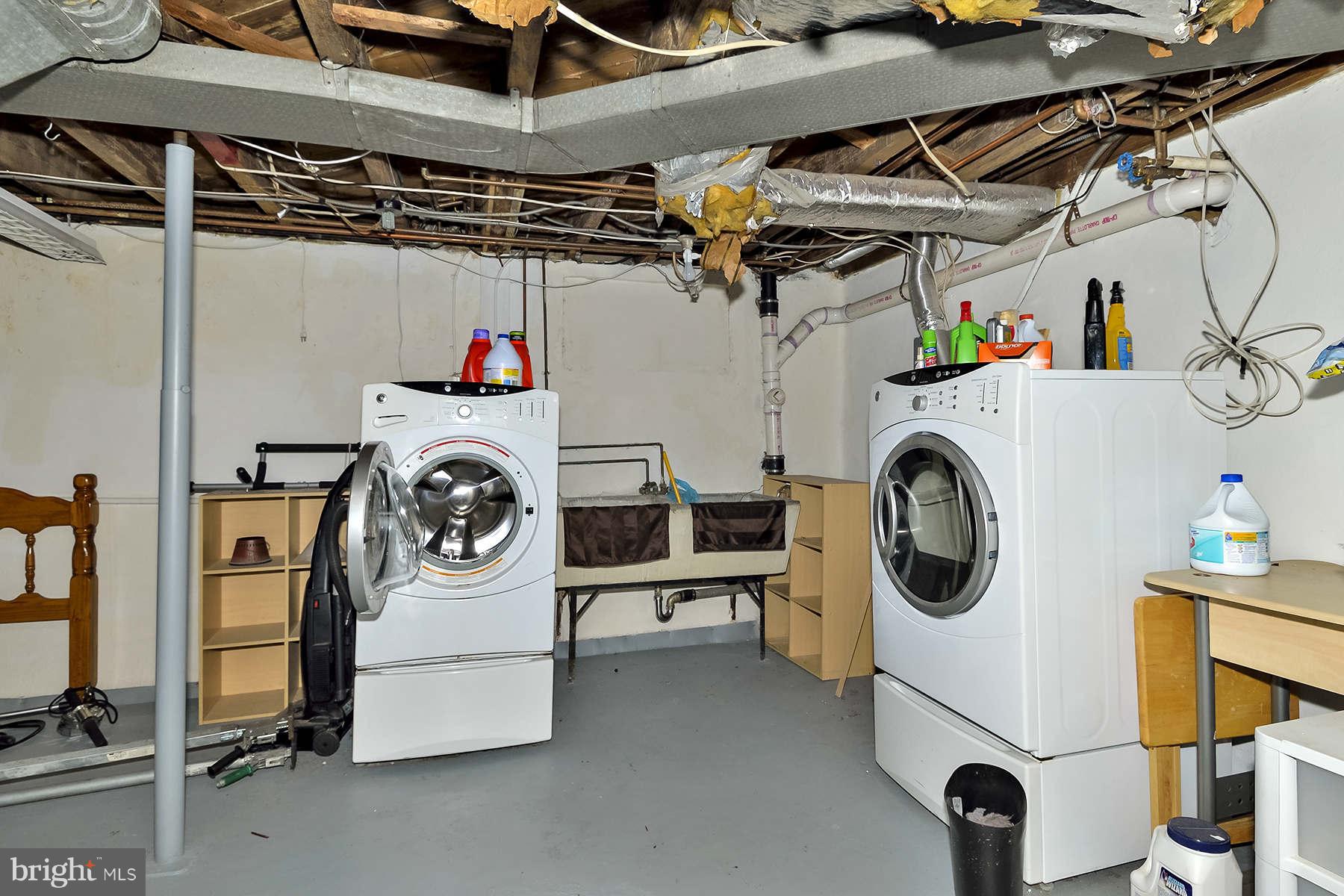 110 Normandy Drive Silver Spring, MD 20901 - Photo 16 of 20 a utility room with dryer and washer