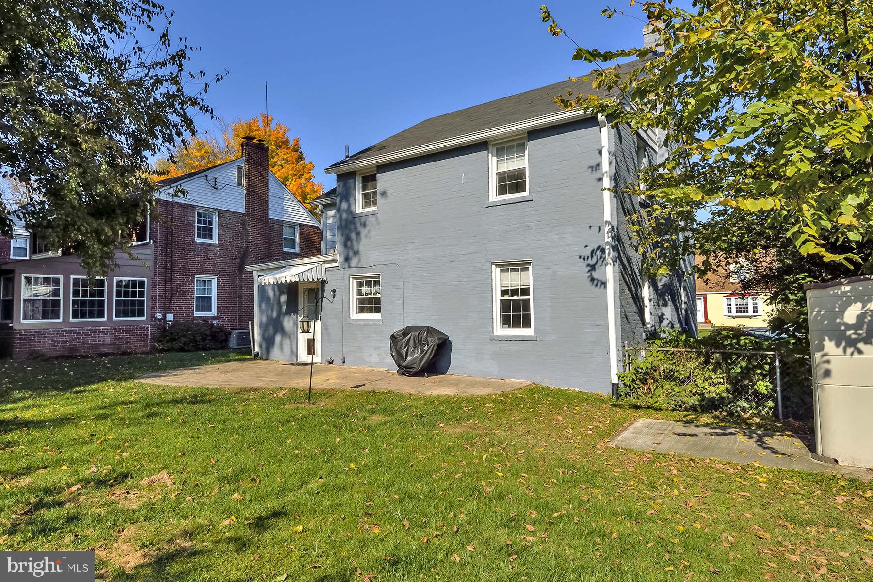 110 Normandy Drive Silver Spring, MD 20901 - Photo 17 of 20 a view of a house with a yard