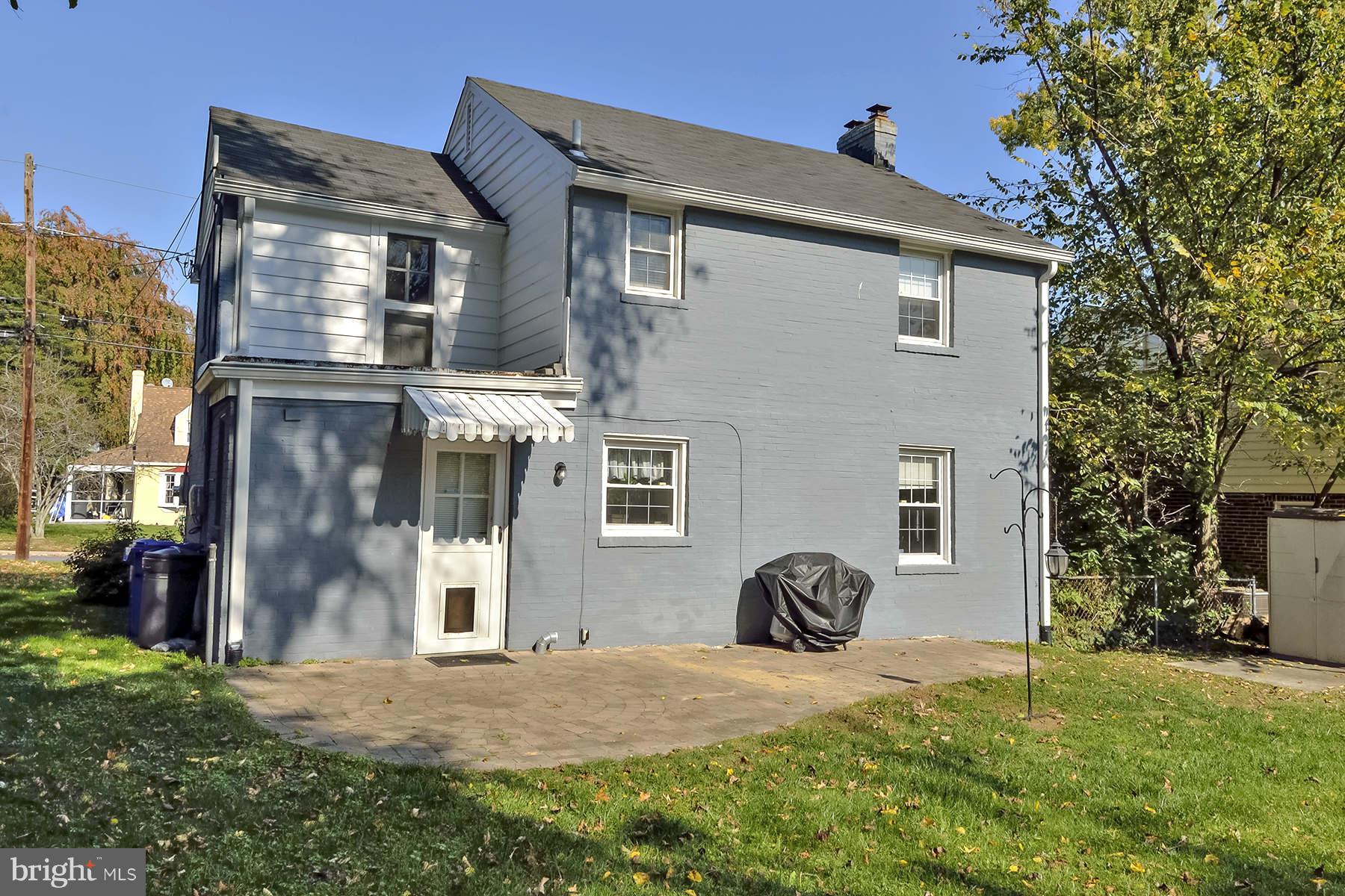 110 Normandy Drive Silver Spring, MD 20901 - Photo 18 of 20 a front view of a house with yard and parking