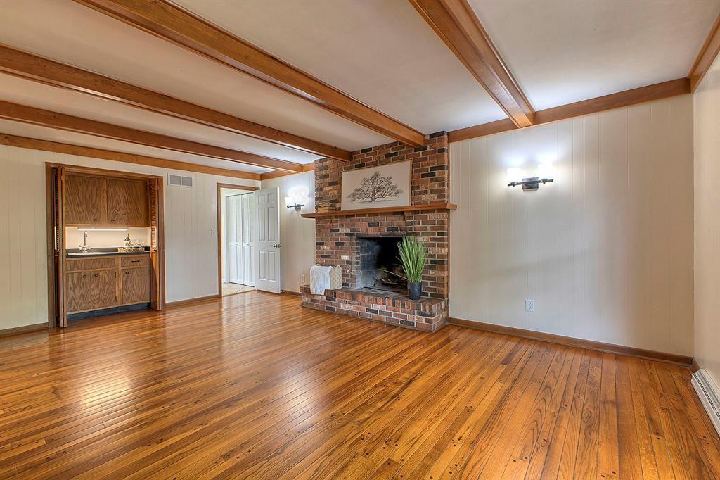 3222 Ridgeway Road Greensburg, PA 15601 - Photo 12 of 46 a view of a livingroom with wooden floor and a kitchen