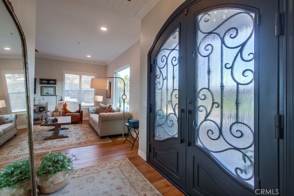 2424 Gird Road Fallbrook, CA 92028 - Photo 16 of 75 FOYER WITH CUSTOM DOORS TO OFFICE / DEN