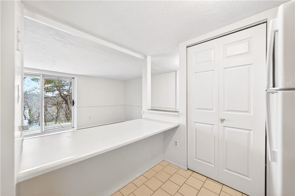 231 Coxcomb Hill Road, Unit 4 New Kensington, PA 15068 - Photo 14 of 23 a view of an empty room with a window