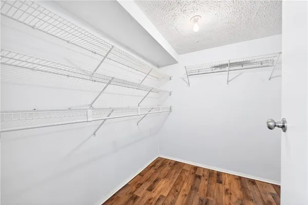 a view of a room with racks on the wall