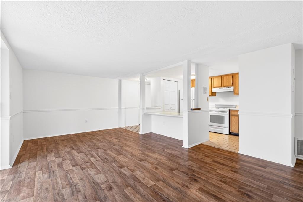 231 Coxcomb Hill Road, Unit 4 New Kensington, PA 15068 - Photo 17 of 23 a view of empty room with wooden floor