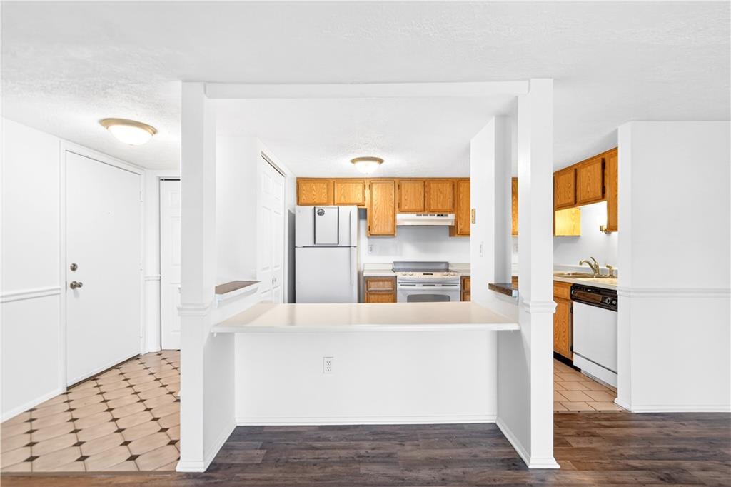 231 Coxcomb Hill Road, Unit 4 New Kensington, PA 15068 - Photo 5 of 23 a room with kitchen island and a window