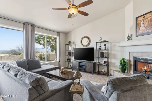 a view of a livingroom with furniture window and outside view