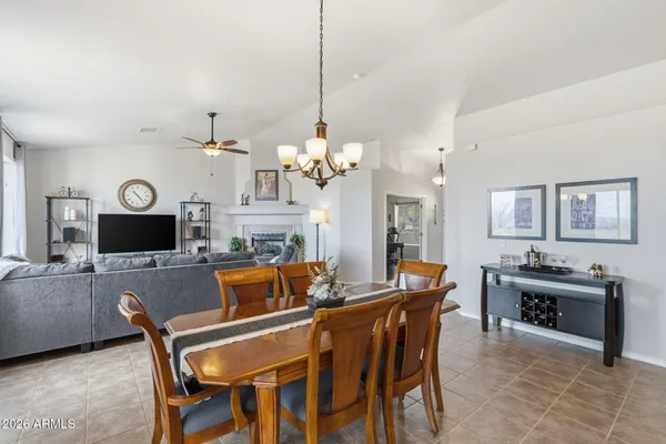 a kitchen with granite countertop a sink and a window