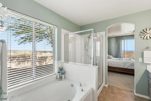 a workspace with furniture window and wooden floor