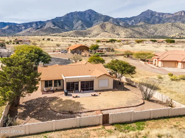 a view of house with ocean view