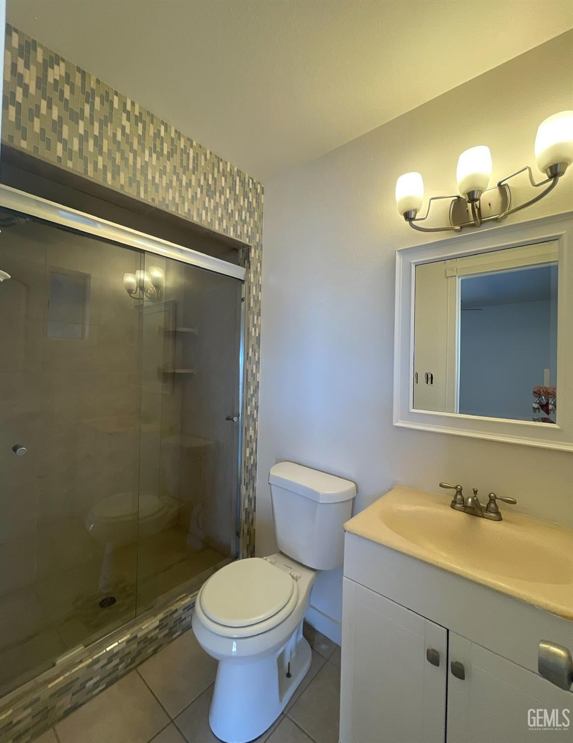 Undisclosed Address Tehachapi, CA 93561 - Photo 11 of 18 a bathroom with a sink toilet and shower