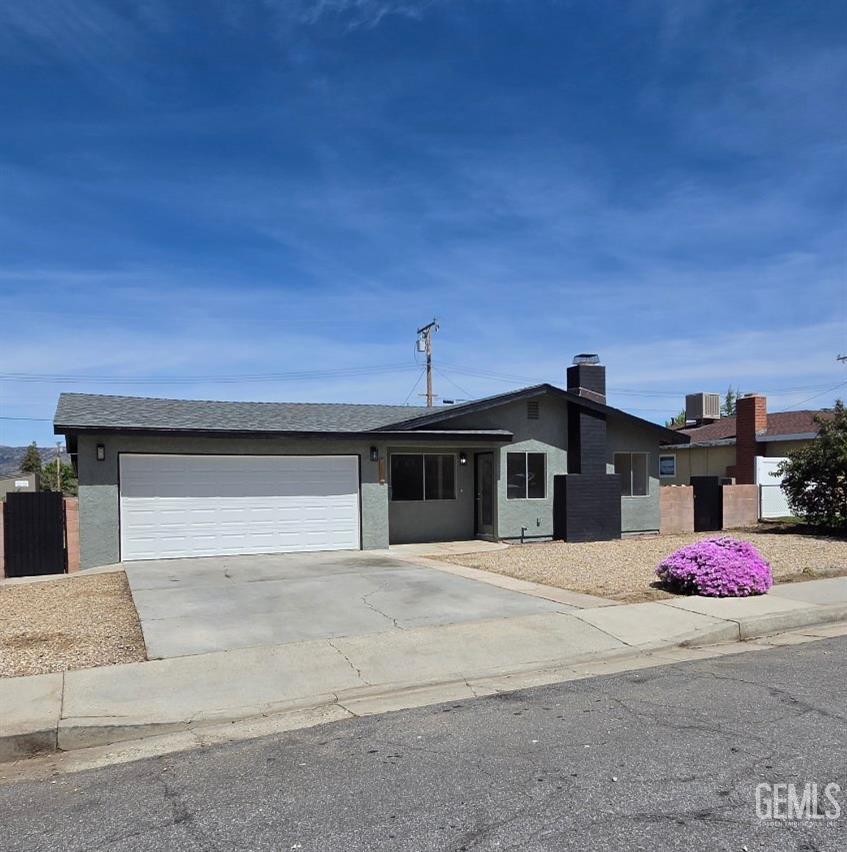 Undisclosed Address Tehachapi, CA 93561 - Photo 17 of 18 a front view of a house with a yard