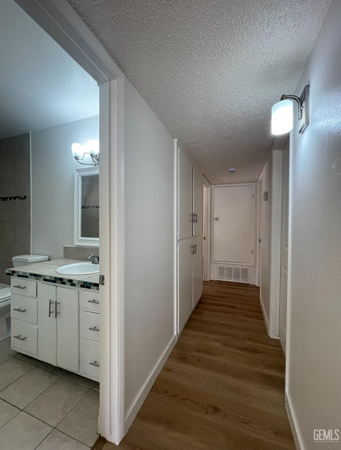 Undisclosed Address Tehachapi, CA 93561 - Photo 7 of 18 a bathroom with a sink and a mirror