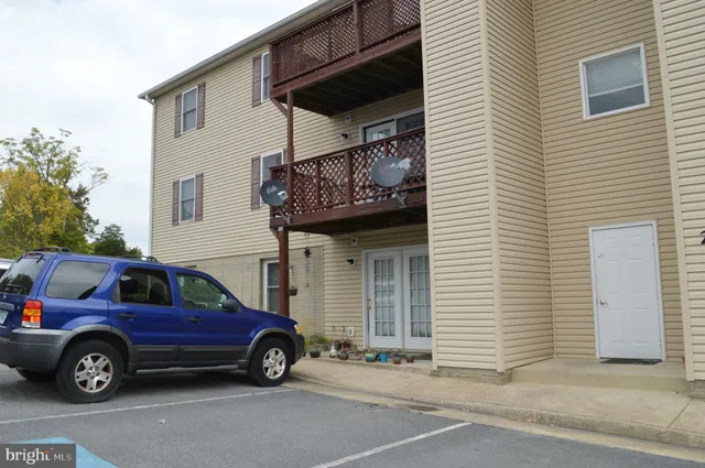 a car parked in front of a house
