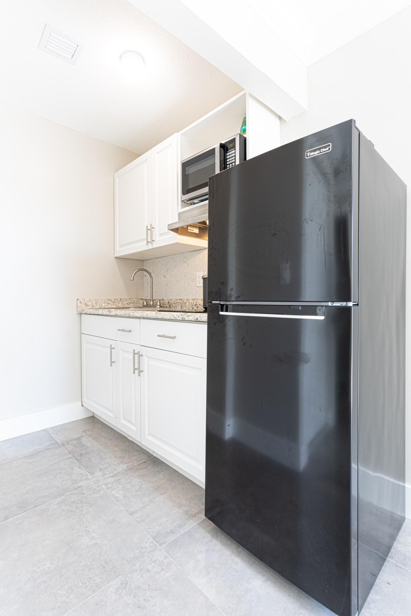 6479 Alexander Road West Palm Beach, FL 33413 - Photo 14 of 20 94F586EF-06A9-425B-9CD7-66CC1DF4DE84
