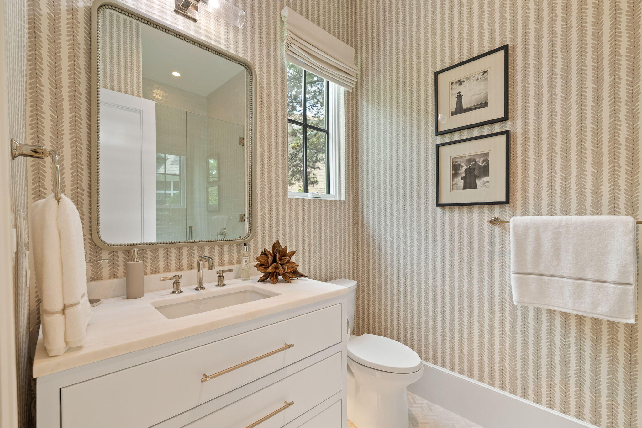 17 North Watch Tower Lane Watersound, FL 32461 - Photo 105 of 195 a bathroom with a sink a toilet and mirror