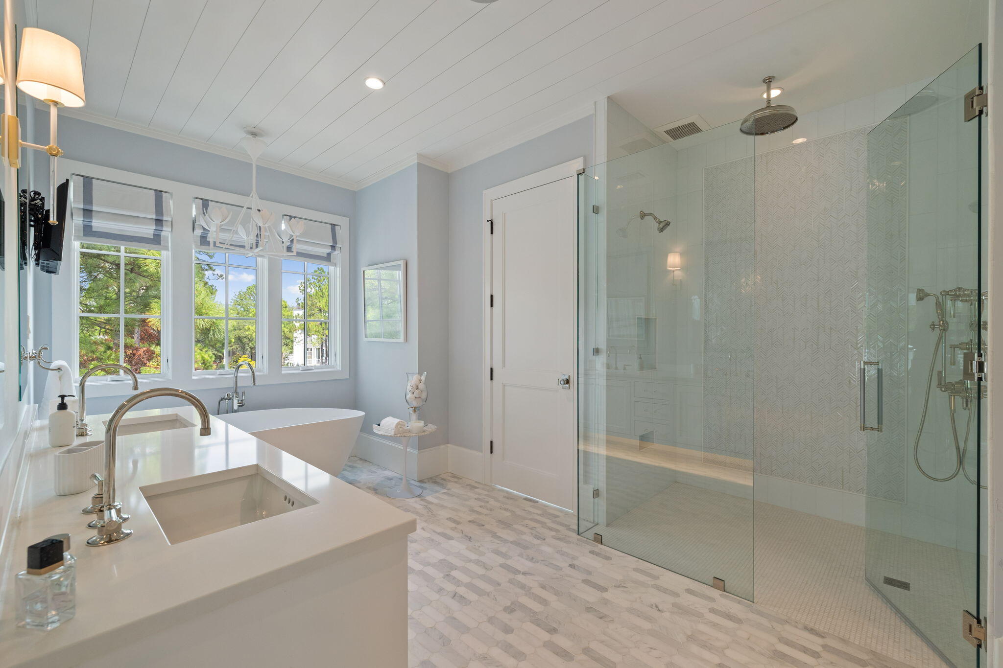 17 North Watch Tower Lane Watersound, FL 32461 - Photo 149 of 195 a bathroom with a sink a shower a mirror and a bathtub