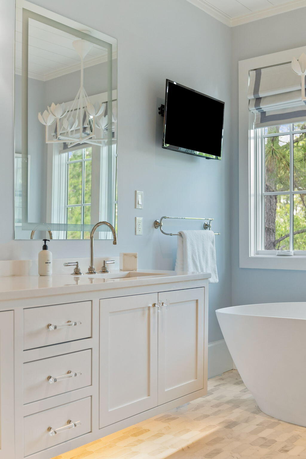 17 North Watch Tower Lane Watersound, FL 32461 - Photo 151 of 195 a spacious bathroom with a double vanity sink a mirror a and a window