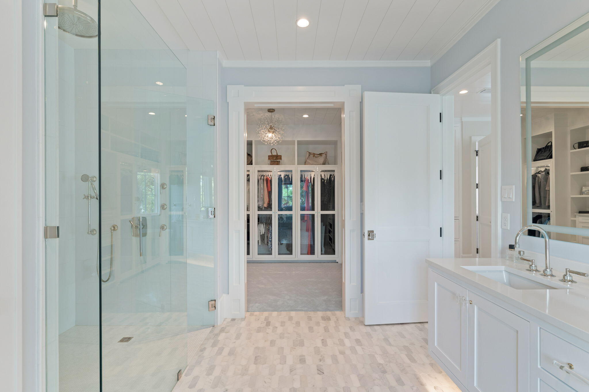 17 North Watch Tower Lane Watersound, FL 32461 - Photo 155 of 195 a bathroom with a shower sink and mirror