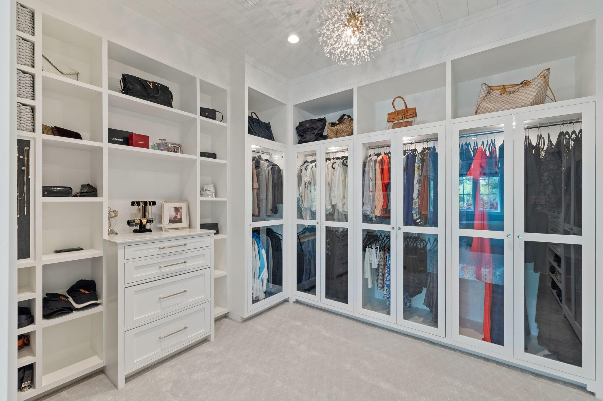 17 North Watch Tower Lane Watersound, FL 32461 - Photo 156 of 195 a view of walk in closet with clothes and shoes