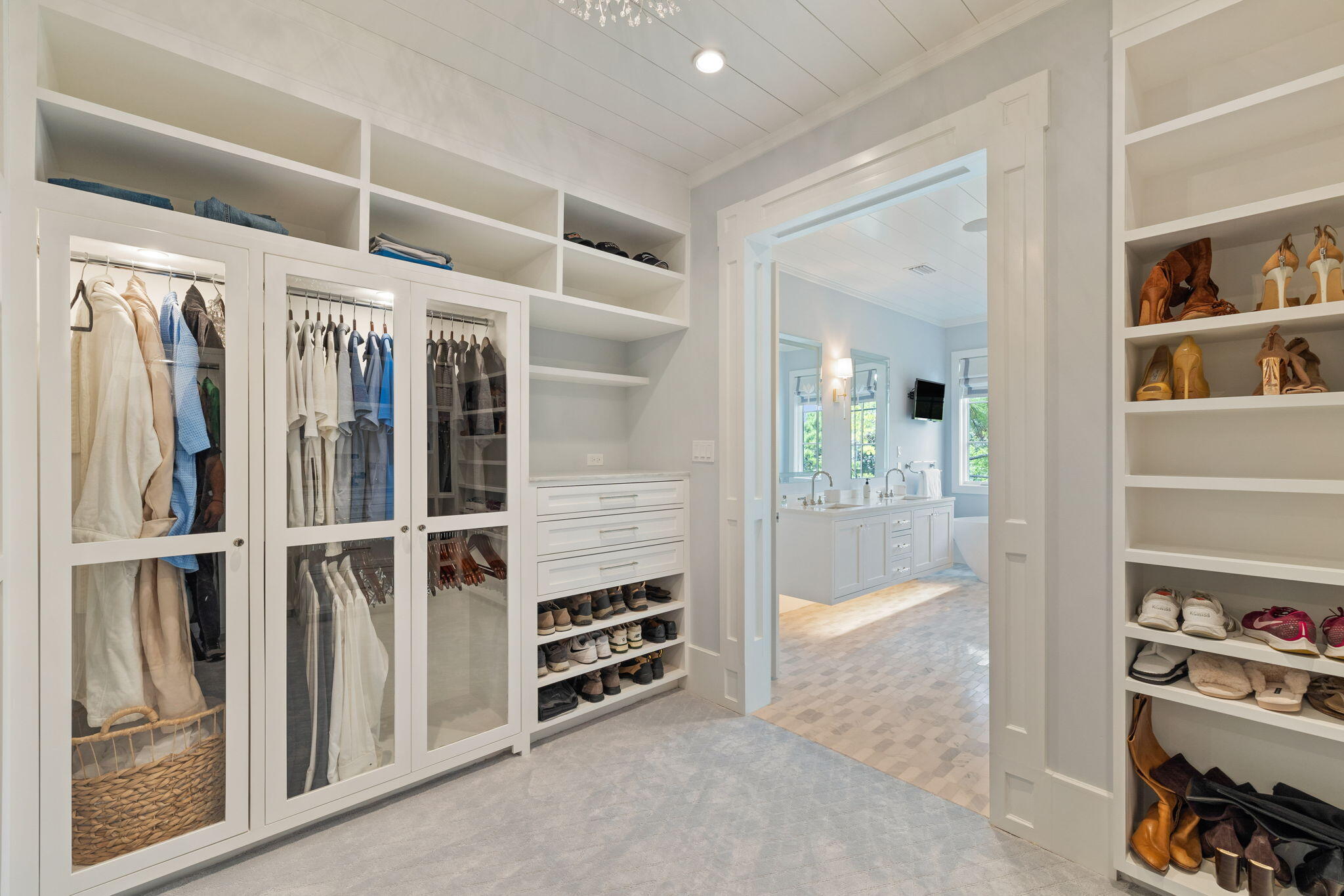 17 North Watch Tower Lane Watersound, FL 32461 - Photo 157 of 195 a view of walk in closet with clothes and shoes