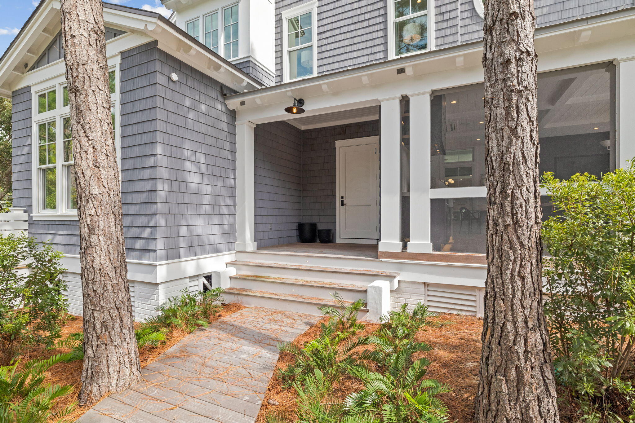 17 North Watch Tower Lane Watersound, FL 32461 - Photo 48 of 195 a view of a house with a window and wooden fence