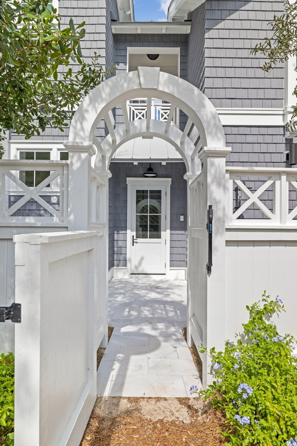 17 North Watch Tower Lane Watersound, FL 32461 - Photo 58 of 195 a front view of a building with a garden