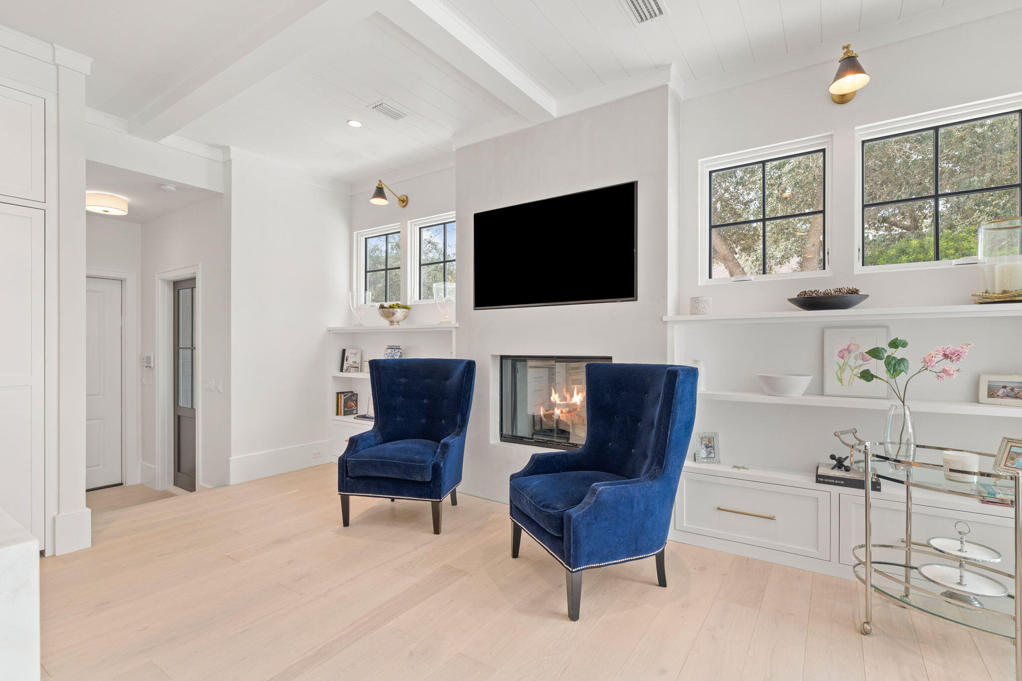 17 North Watch Tower Lane Watersound, FL 32461 - Photo 80 of 195 a living room with furniture fireplace and a flat screen tv