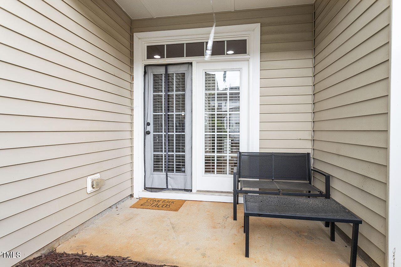 1329 Still Monument Way Raleigh, NC 27603 - Photo 32 of 42 a view of a bench in a patio