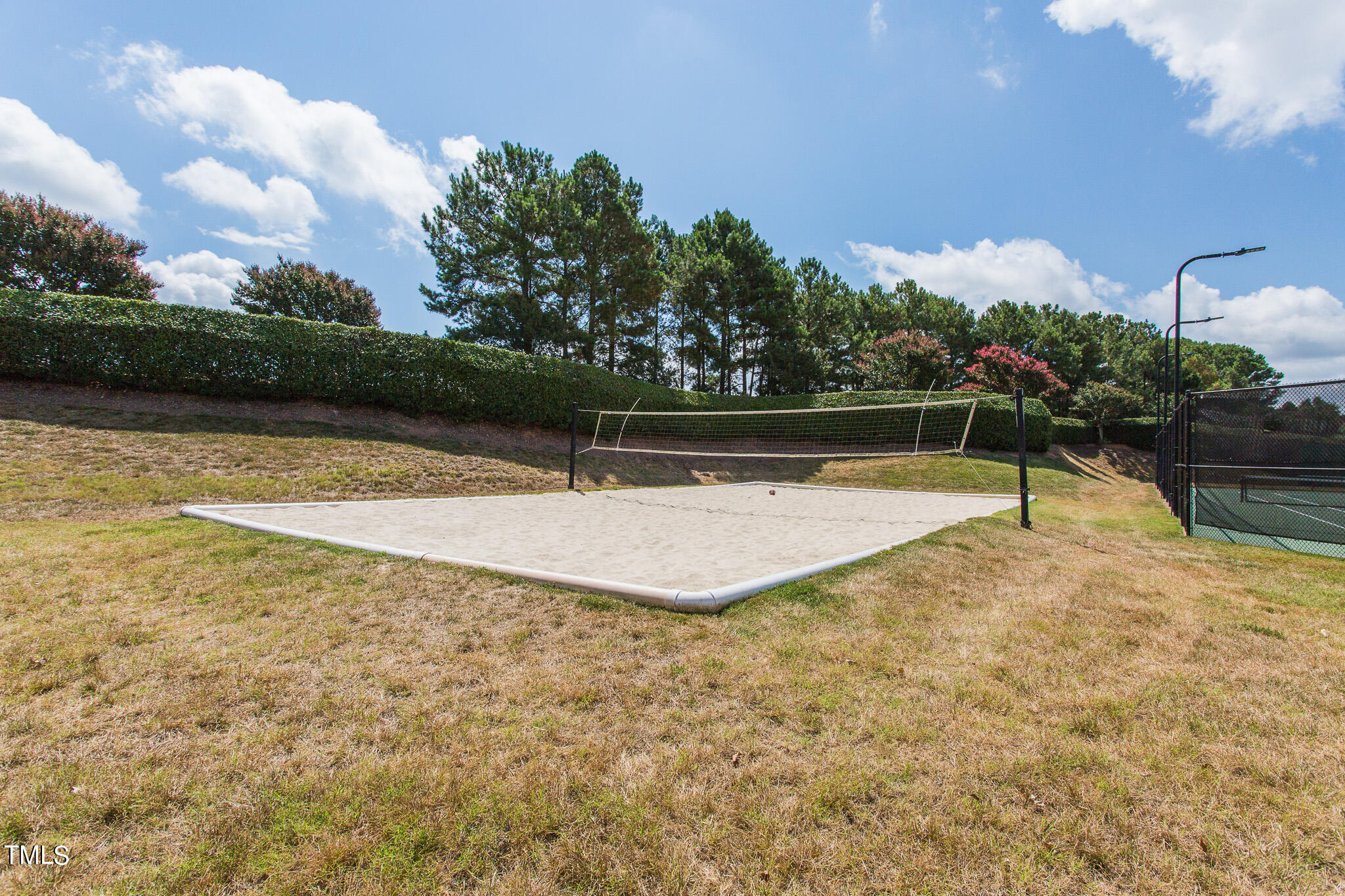 1329 Still Monument Way Raleigh, NC 27603 - Photo 41 of 42 a view of a swimming pool with a lake