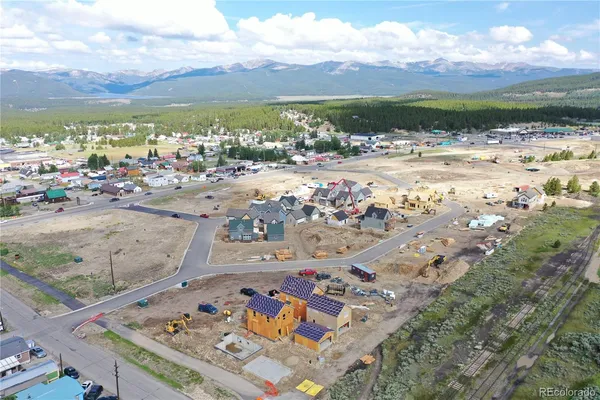 a view of a city with an ocean beach