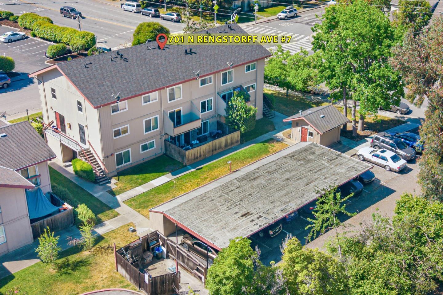 701 North Rengstorff Avenue, Unit 7 Mountain View, CA 94043 - Photo 27 of 32 an aerial view of a house with a swimming pool