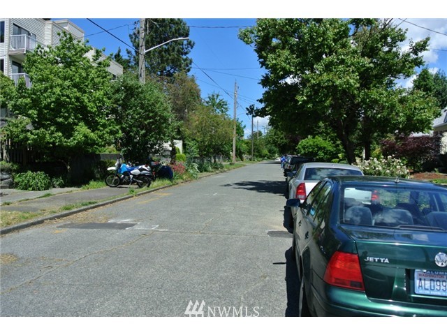 4001 Whitman Avenue North Seattle, WA 98103 - Photo 8 of 8 a backyard of a house with lots of green space