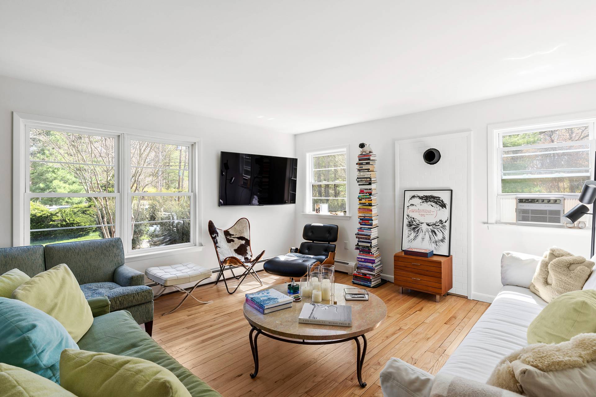 10 Glade Road East Hampton, NY 11937 - Photo 4 of 10 a living room with furniture and a flat screen tv