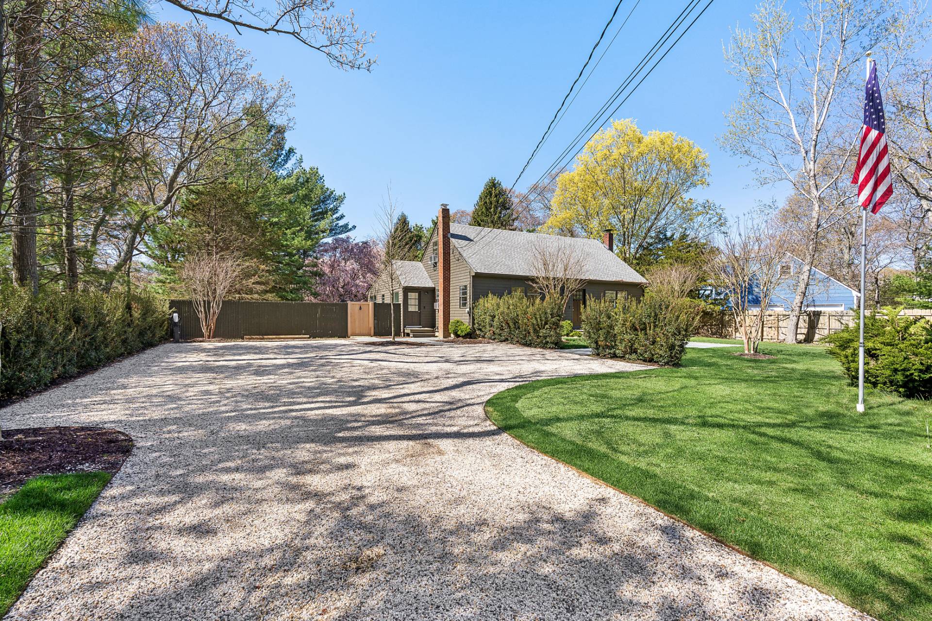 10 Glade Road East Hampton, NY 11937 - Photo 10 of 10 a view of a house with a yard