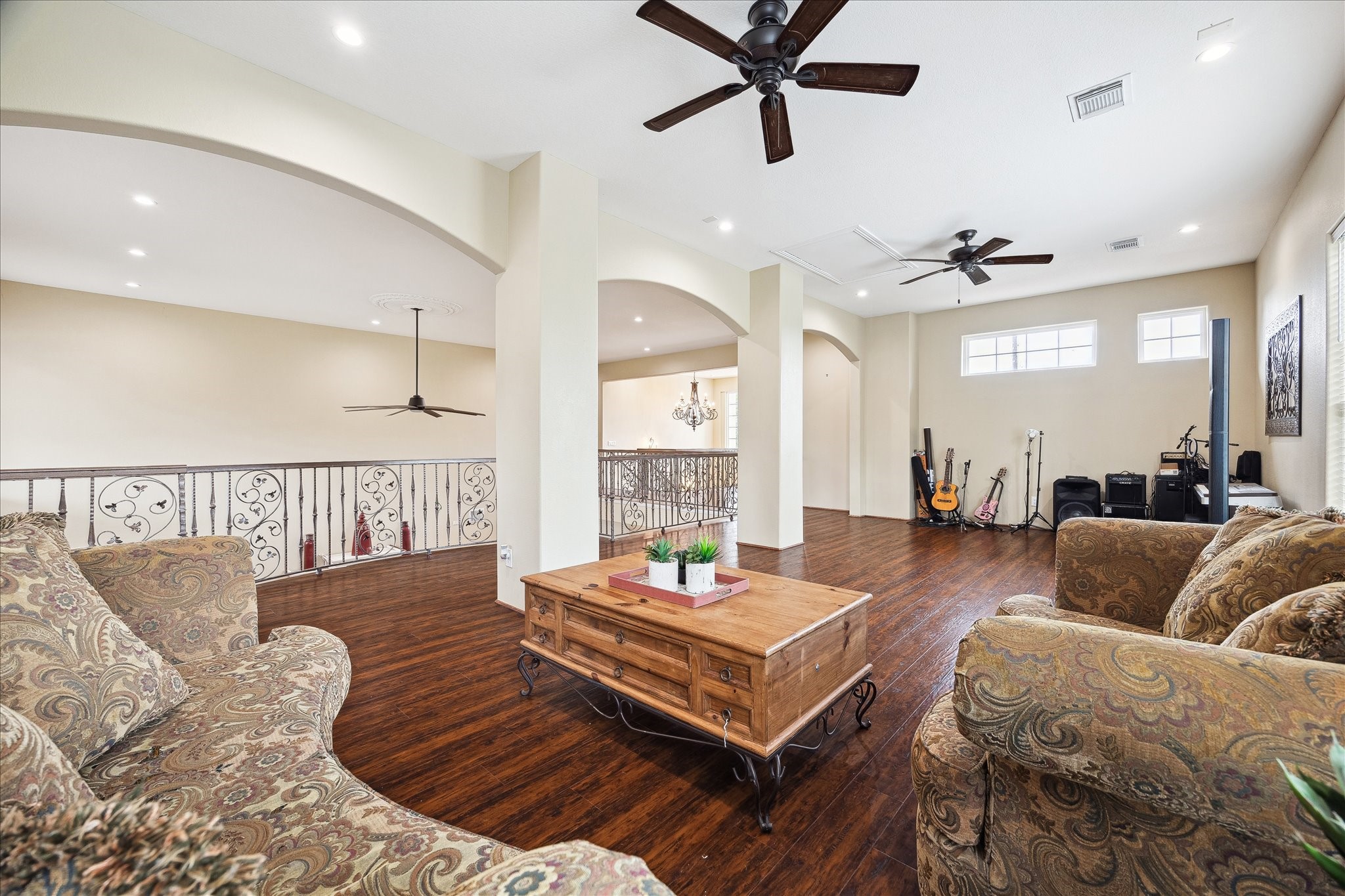 8917 Hawk Road Pearland, TX 77584 - Photo 15 of 33 a living room with furniture and wooden floor