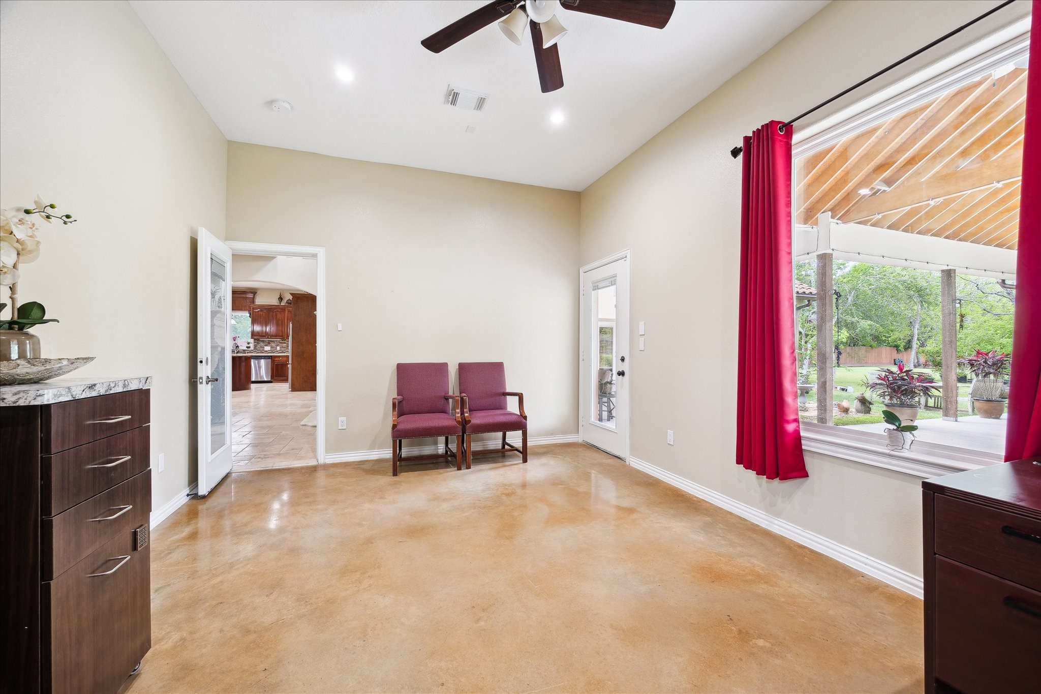 8917 Hawk Road Pearland, TX 77584 - Photo 22 of 33 a living room with furniture and a large window