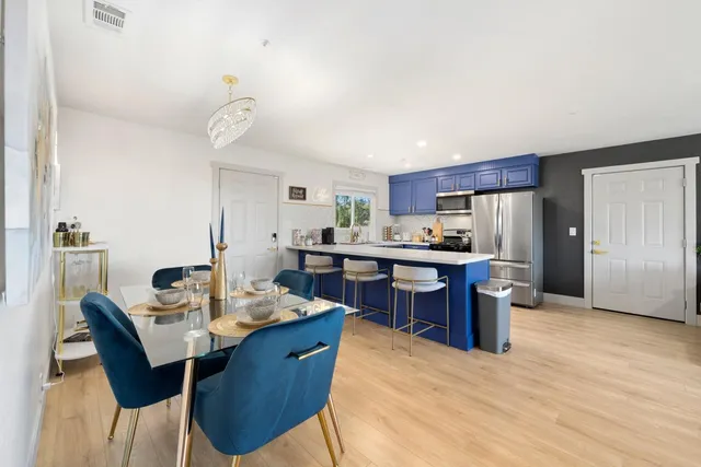 a bathroom with a glass shower door