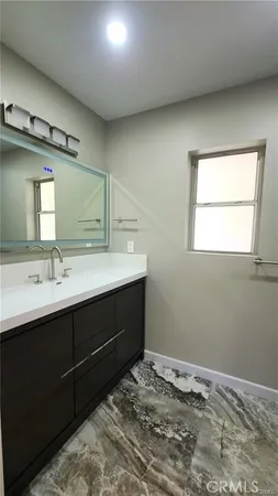 a view of balcony with furniture and city view